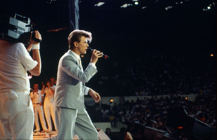 David Bowie durante apresentação no estádio de Wembley, em Londres, no festival "Live Aid", em 13 de julho de 1985. • Getty Images