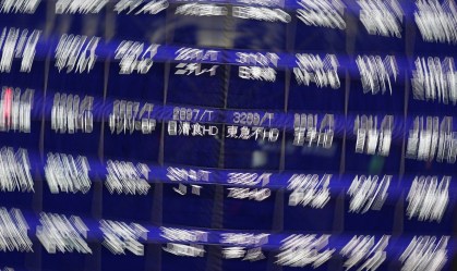 Bolsas da Ásia fecham sem direção única, com reação contida à vacina da Moderna