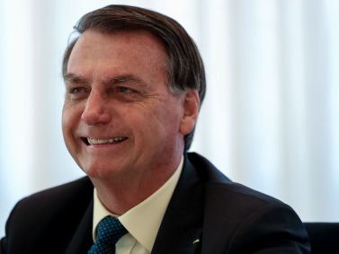 Jair Bolsonaro sorrindo