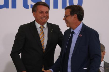O presidente Jair Bolsonaro e o presidente da Embratur Gilson Machado