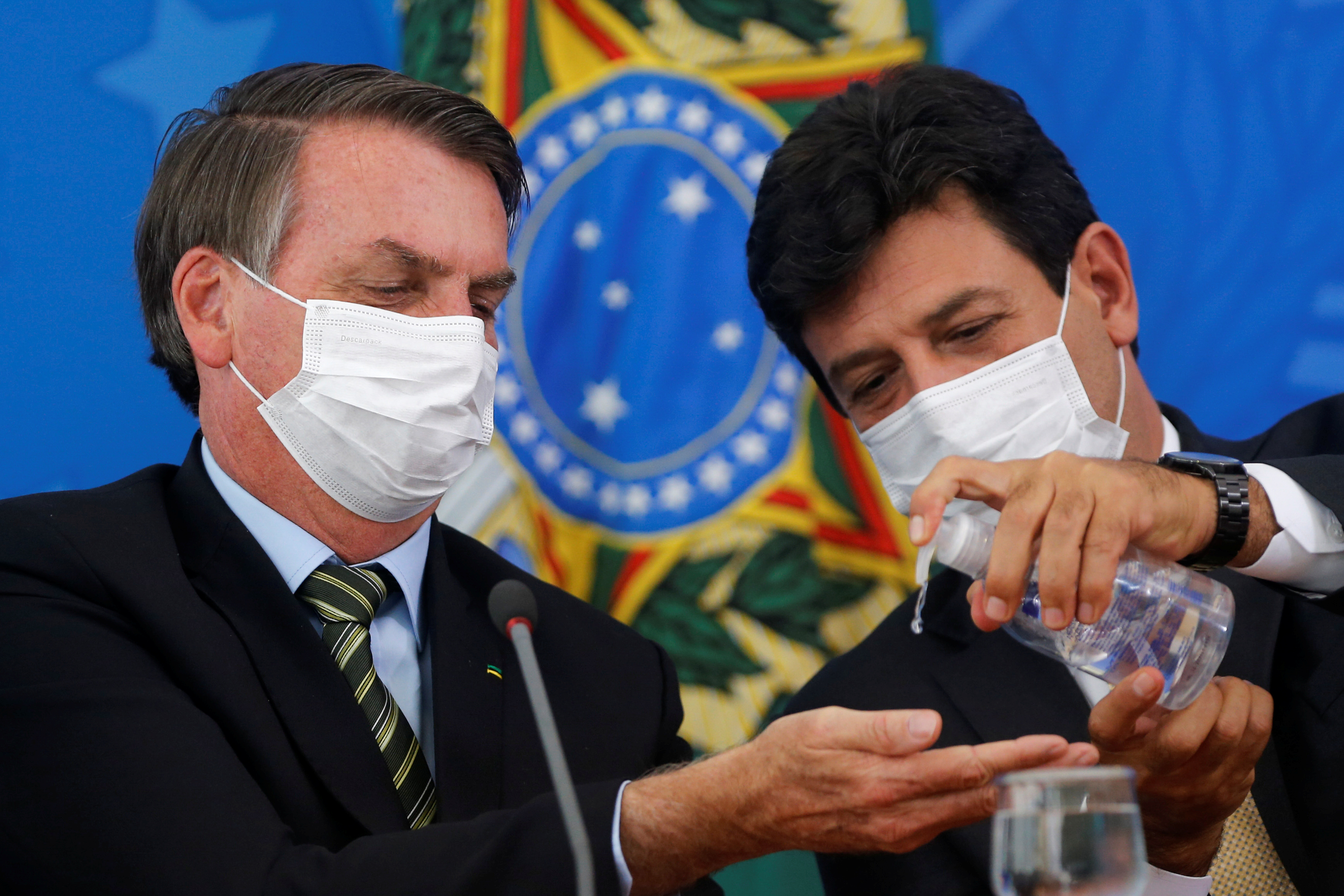 O presidente  Jair Bolsonaro, e o ministro da Saúde, Luiz Henrique Mandetta