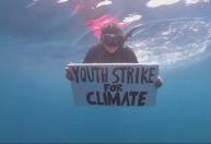 Ativistas protestam debaixo d’água contra aquecimento global nas Ilhas Maurício