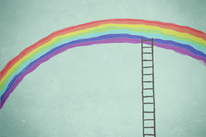Acessibilidade: Escada alcançando um arco-íris, símbolo da comunidade LGBT