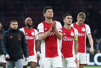 Jogadores do Ajax durante partida da Liga dos Campeões
