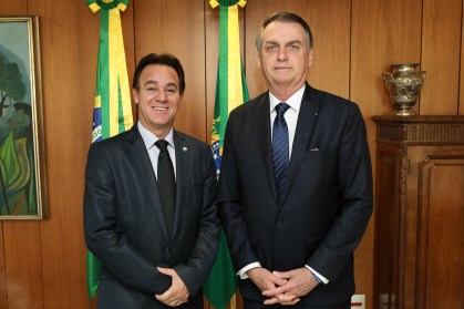 O presidente Jair Bolsonaro e Adilson Barroso, presidente nacional do Patriota