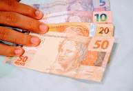 Auxílio Brasil de 2022 começa a ser pago nesta terça-feira (18); veja o calendário