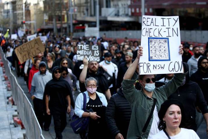 Protestos contra as medidas da Covid-19 impostas pelo governo australiano, em Sydney / Getty Images