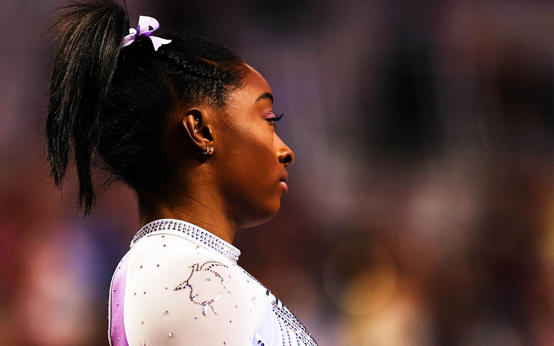 Detalhe da roupa de Simone Biles com uma cabra (Goat, em inglês) Detalhe da roupa de Simone Biles com uma cabra (Goat, em inglês)