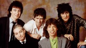 Charlie Watts e o restante dos Rolling Stones