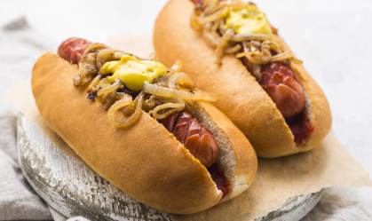 Comer um cachorro-quente pode diminuir 36 minutos de vida, diz estudo