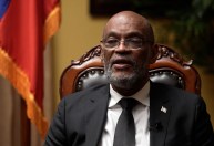 Primeiro-ministro do Haiti assina renúncia e conselho de transição toma posse