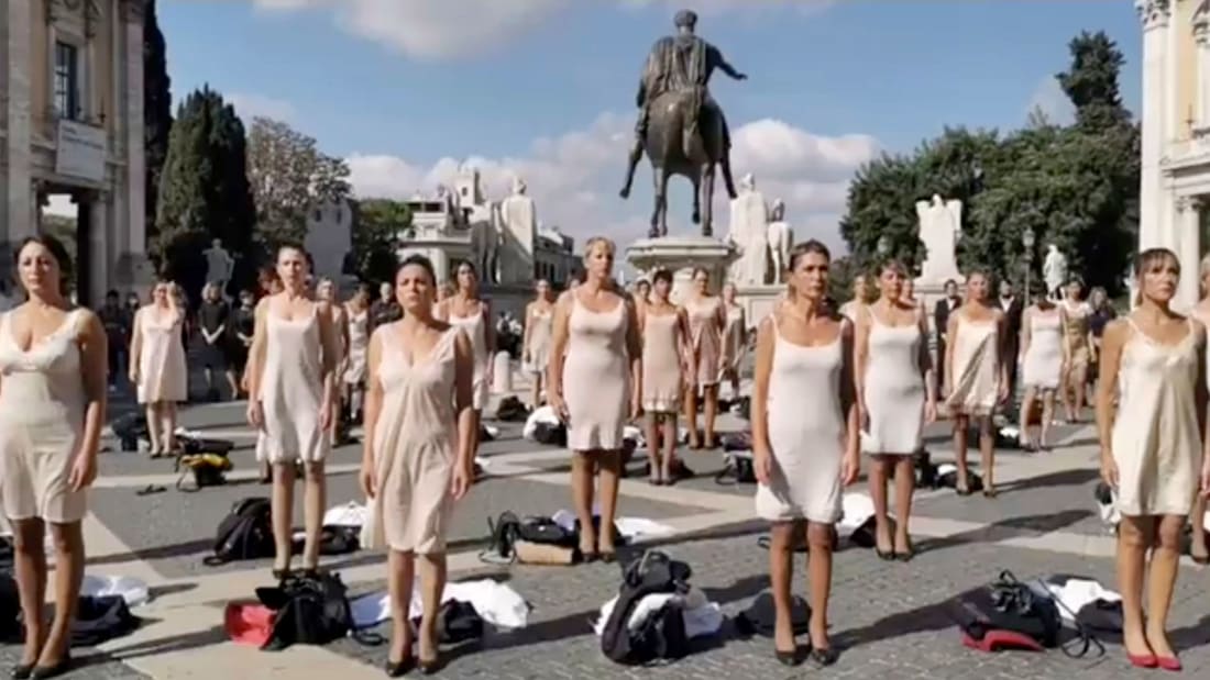 http___cdn.cnn.com_cnnnext_dam_assets_211022095333-screengrab-alitalia-flight-attendant-protest-rome-10-20-2021