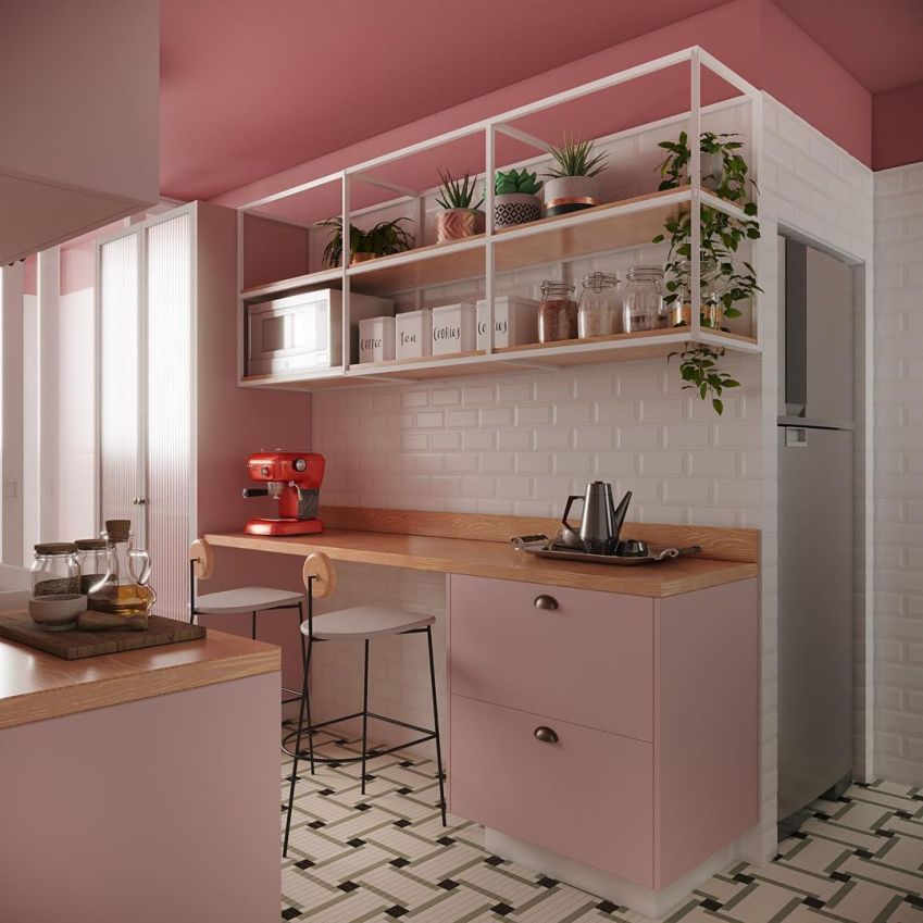 A cozinha rosa integrada com a lavanderia do projeto #QtMaurilio, da Quattrino Arquitetura/ Divulgação