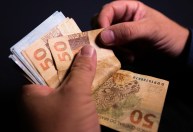 Auxílio emergencial evitou piora da desigualdade no país em 2020, mostra IBGE