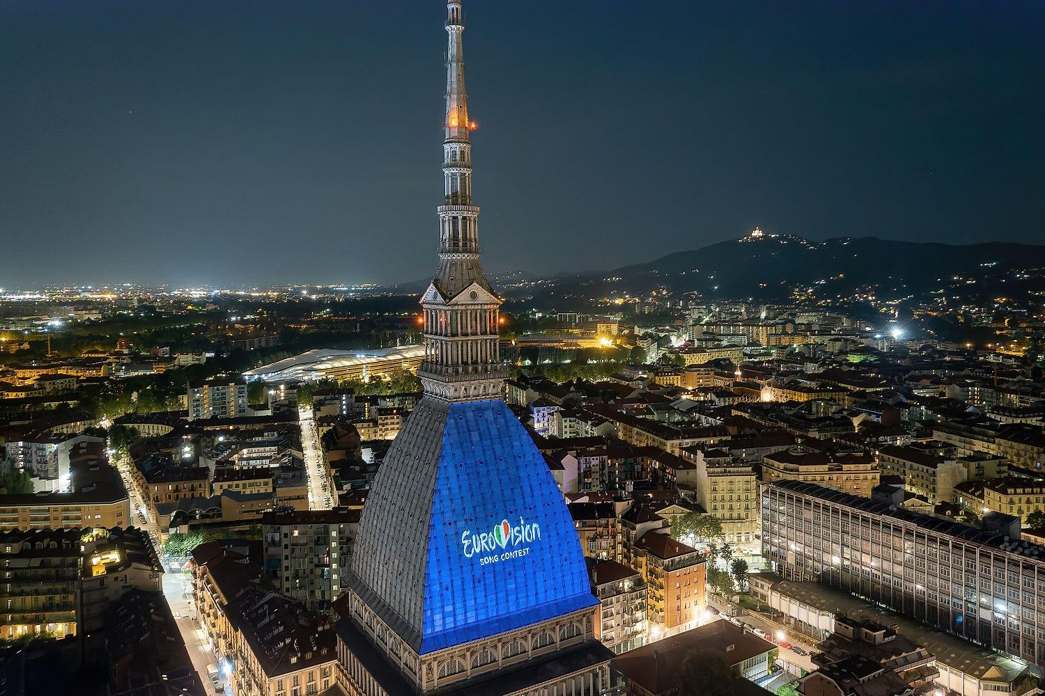 Eurovision Song Contest logo projected on the Mole Antonelliana. The 66th edition will be held in Turin in May 2022. Turin, Italy - January 2022