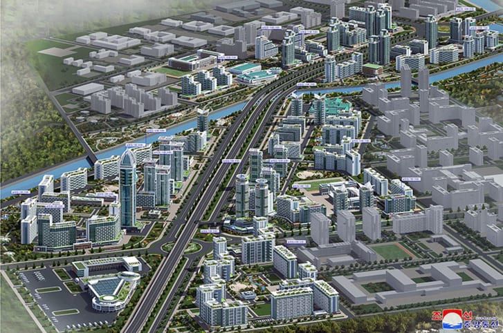 Uma projeção 3D do empreendimento mostra um arranha-céu alto à esquerda, com outras torres ao longo de uma rua larga / Foto: EyePress News/Shutterstock