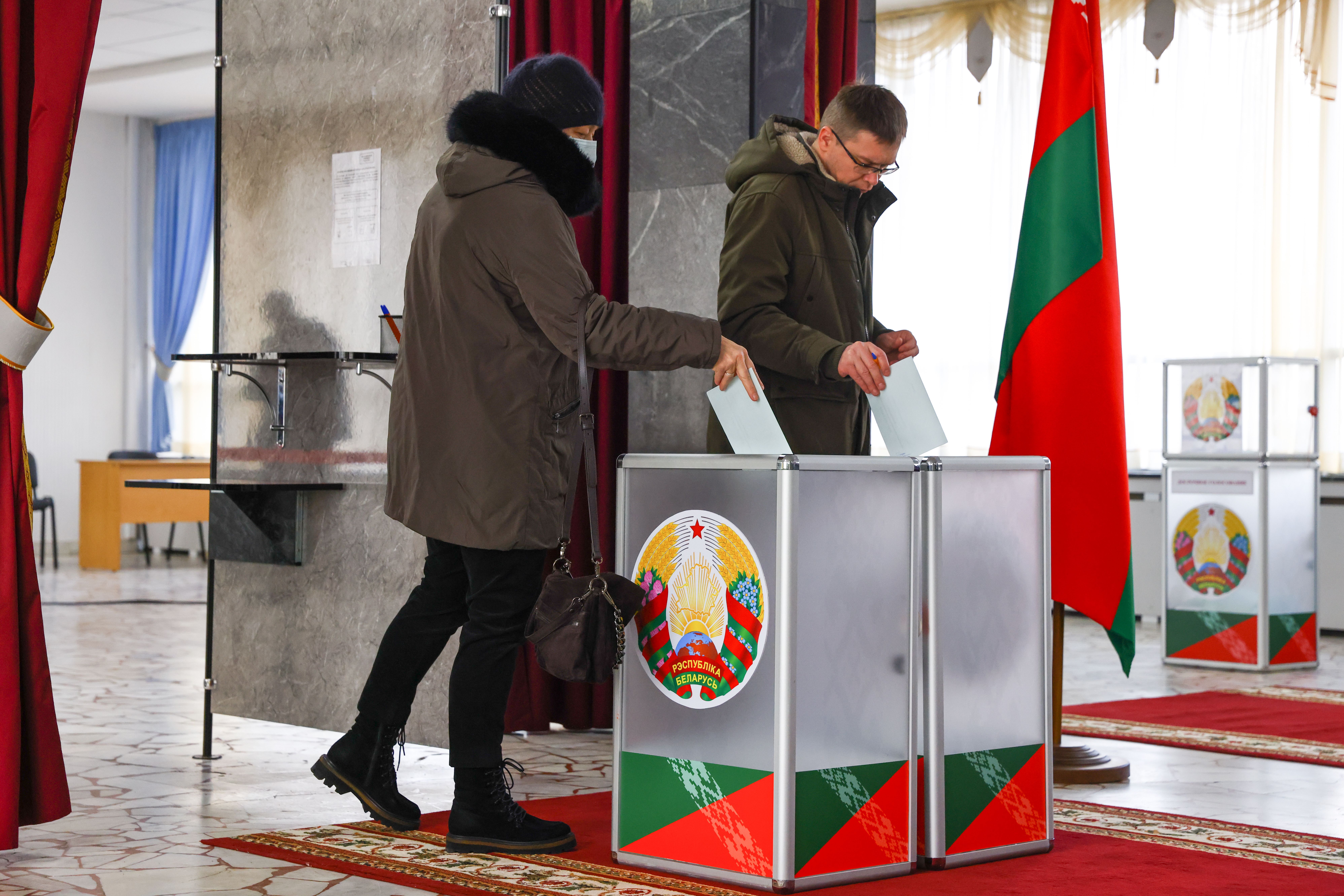 MINSK, BELARUS - FEBRUARY 27, 2022: People cast their votes in the 2022 Belarusian constitutional referendum. In August 2020, mass protests erupted in major cities across Belarus after the results of the 2020 Belarusian presidential election were announced. Belarusian President Lukashenko announced plans for amendments to the constitution and his readiness to redistribute presidential powers to the other branches of government. Peter Kovalev/TASS (Photo by Peter KovalevTASS via Getty Images)