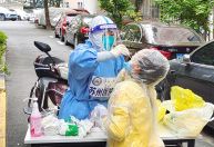 China constrói estações permanentes de testes de Covid para vida após lockdown
