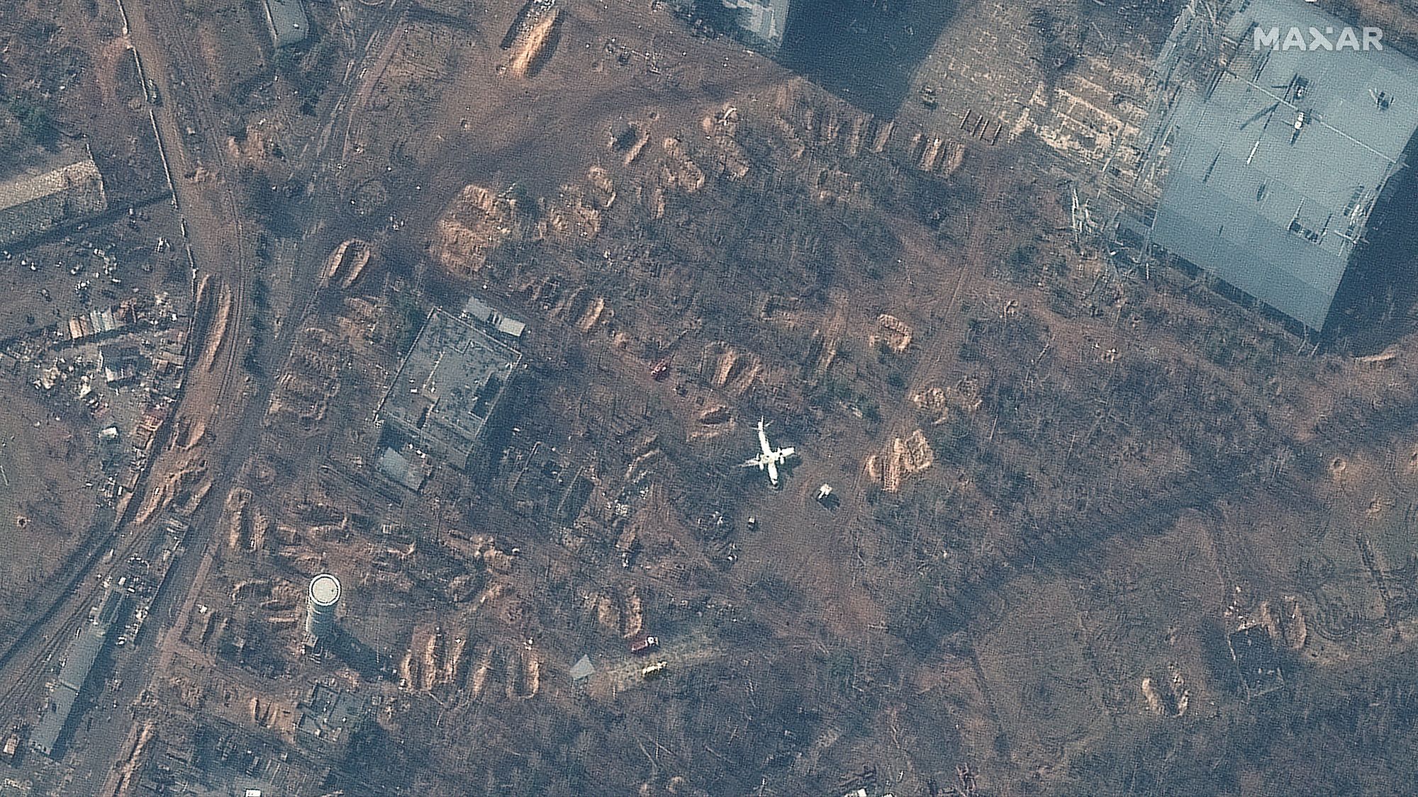 A satellite image shows empty revetments at Antonov Airport in Hostomel