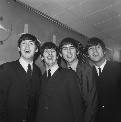 The Beatles upon arrival from London in 1964. From Left to right: Paul McCartney, Ringo Starr, George Harrison and John Lennon. / Bettmann Archive