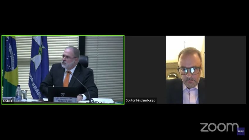 Momento em que o procurador-geral da República Augusto Aras se levanta para entrar em luta corporal com o subprocurador-geral Nívio de Freitas Silva Filho / Reprodução
