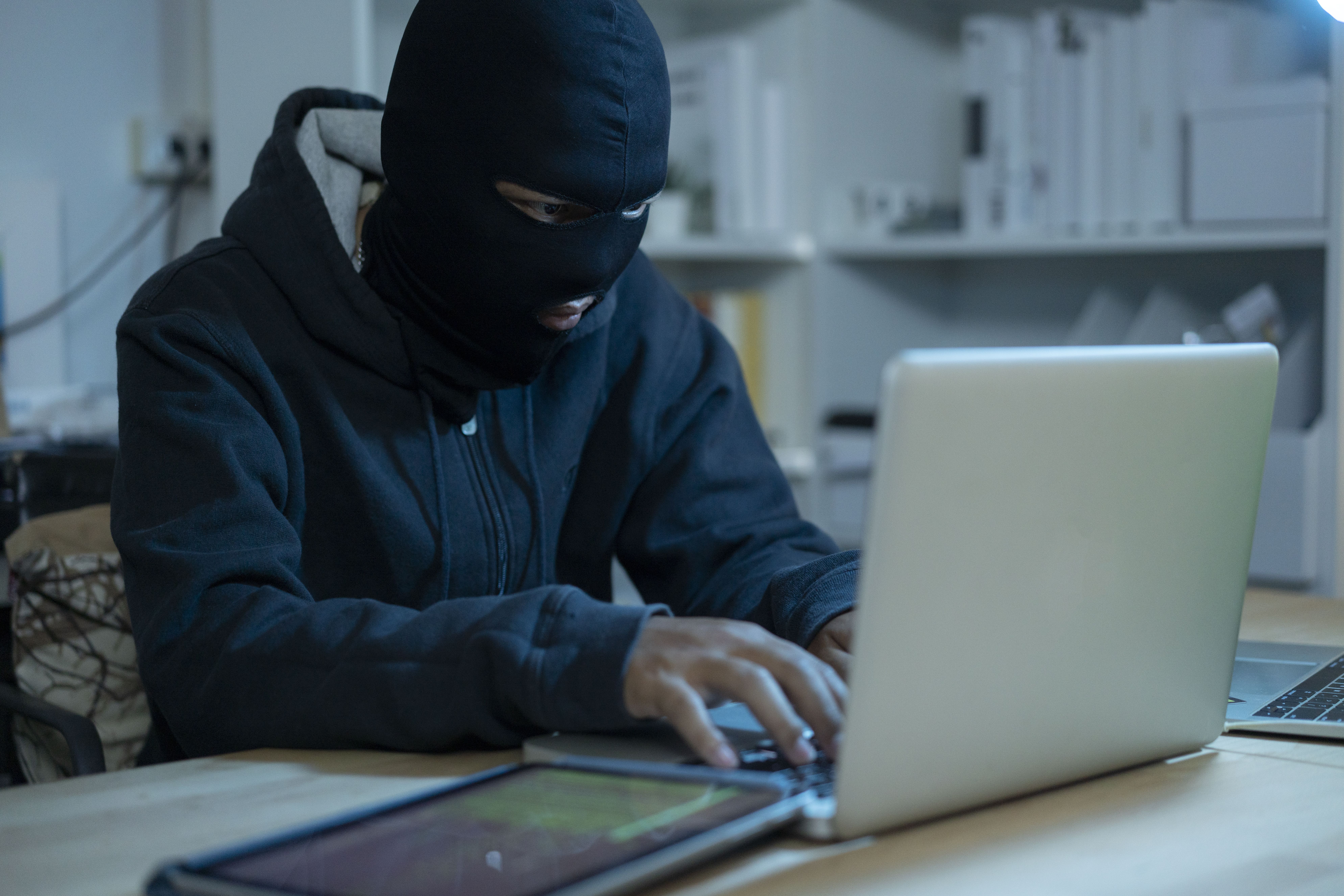 Hacker is Using Computer