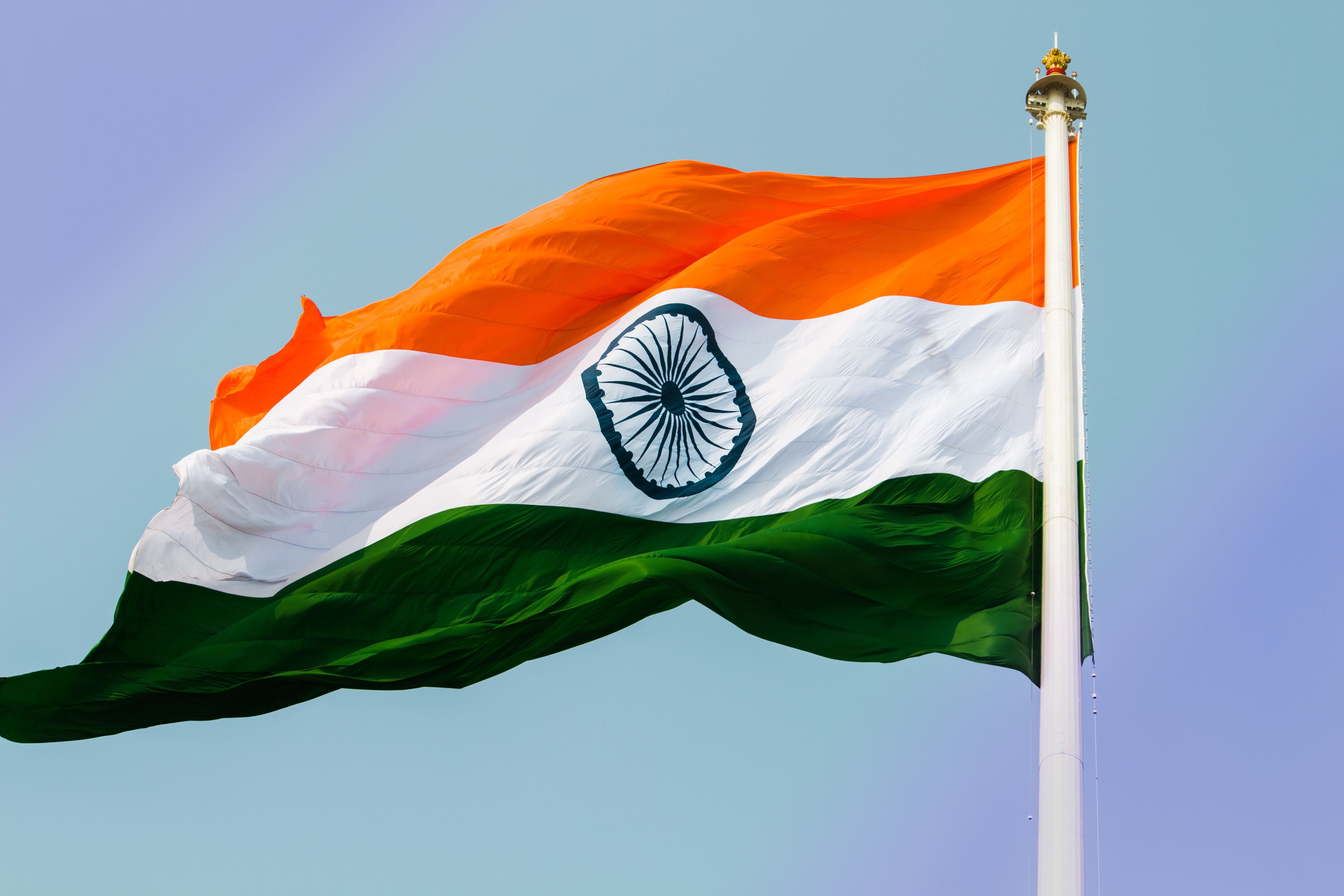 Low Angle View Of Indian Flag Against Clear Sky
