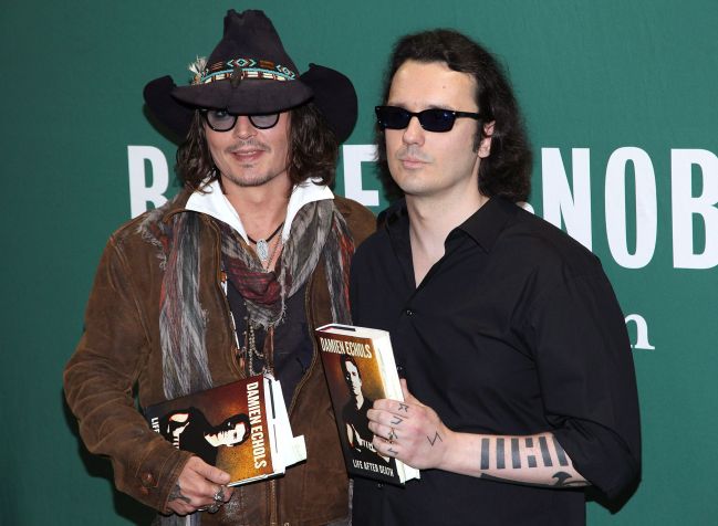 Damien Echols e Johnny Depp, em Nova York, em 2012 / WireImage
