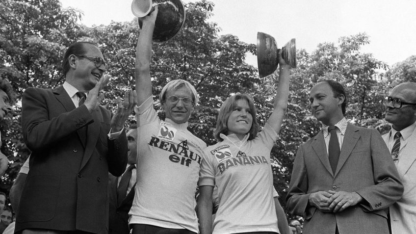 arianne Martin sobe ao pódio em Paris com Laurent Fignon em 1984 / Getty Images