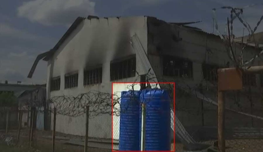 Tanque de água instalado do lado de fora do armazém de Olenivka, na região de Donetsk / Reprodução / CNN Internacional