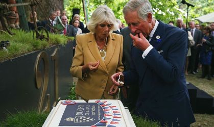 O então príncipe Charles e sua esposa, Duquesa da Cornualha, comemoram 21º aniversário da marca Duchy Originals, em setembro de 2013