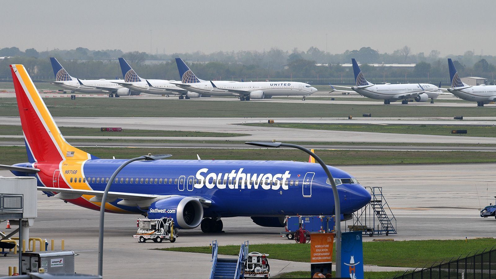 A Southwest Airlines Boeing 737 MAX 8 aircraft is pictured in front of United Airlines planes, including Boeing 737 MAX 9 models, at William P. Hobby Airport in Houston