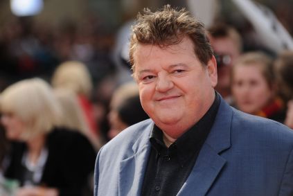 Ator Robbie Coltrane, que interpretava o personagem Rubeus Hagrid em Harry Potter, durante a premiere mundial de &quot;As Relíquias da Morte - Parte 2&quot;, em julho de 2011, em Londres.