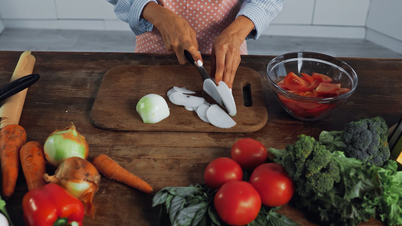 221123143434-onions-tomatoes-leafy-greens-vegetables-stock