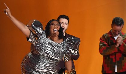 LOS ANGELES, CALIFORNIA - FEBRUARY 05: (FOR EDITORIAL USE ONLY) Lizzo accepts the Record Of The Year award for “About Damn Time” onstage during the 65th GRAMMY Awards at Crypto.com Arena on February 05, 2023 in Los Angeles, California. (Photo by JC Olivera/WireImage)