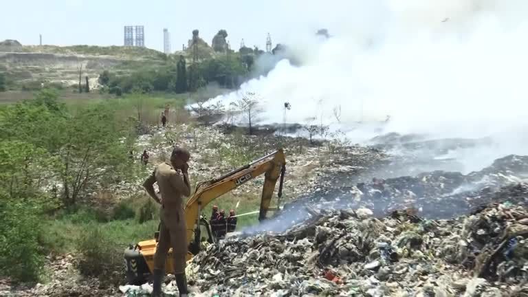 Firefighters battle landfill fire in southwestern Indian city of Kochi