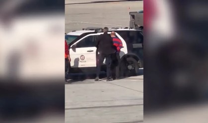 230326173933-lax-passenger-open-door-still
