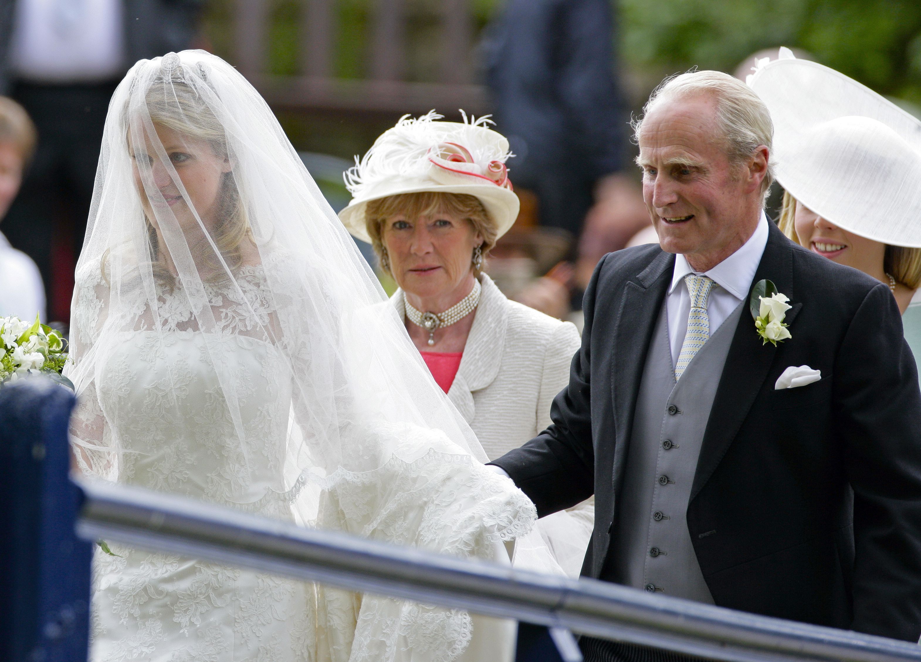 Lady Sarah McCorquodale e Neil McCorquodale no casamento de sua filha, Emily, em 2012, na Inglaterra. Indigo/Getty Images