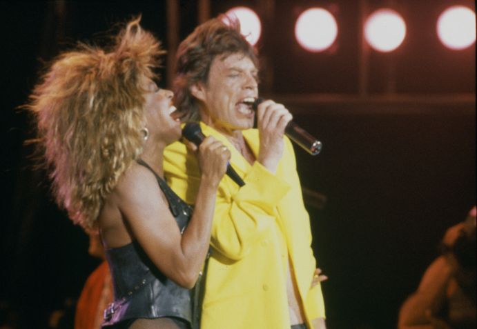 Tina Turner se apresenta com Mick Jagger / Getty Images