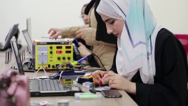 In conservative Gaza, a woman finds rare job niche by repairing phones