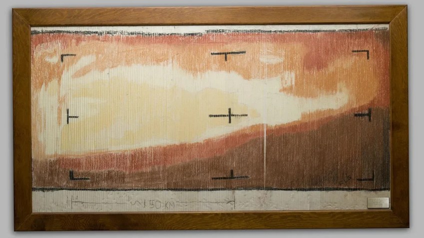 A versão colorida à mão da imagem da Mariner 4 faz parte de uma exposição no Laboratório de Propulsão a Jato da Nasa em Pasadena, Califórnia. As iniciais "RLG" (canto inferior direito) pertencem a Richard Grumm. • Dan Goods/NASA/JPL-Caltech