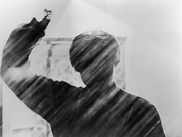 Anthony Perkins as Norman Bates in "Psychosis"by Alfred Hitchcock. He assumes his mother's alternative personality after killing her. • Paramount