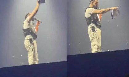 Imagem de destaque do post: Fã arremessa livro em Drake e cantor reage: "Você tem sorte"