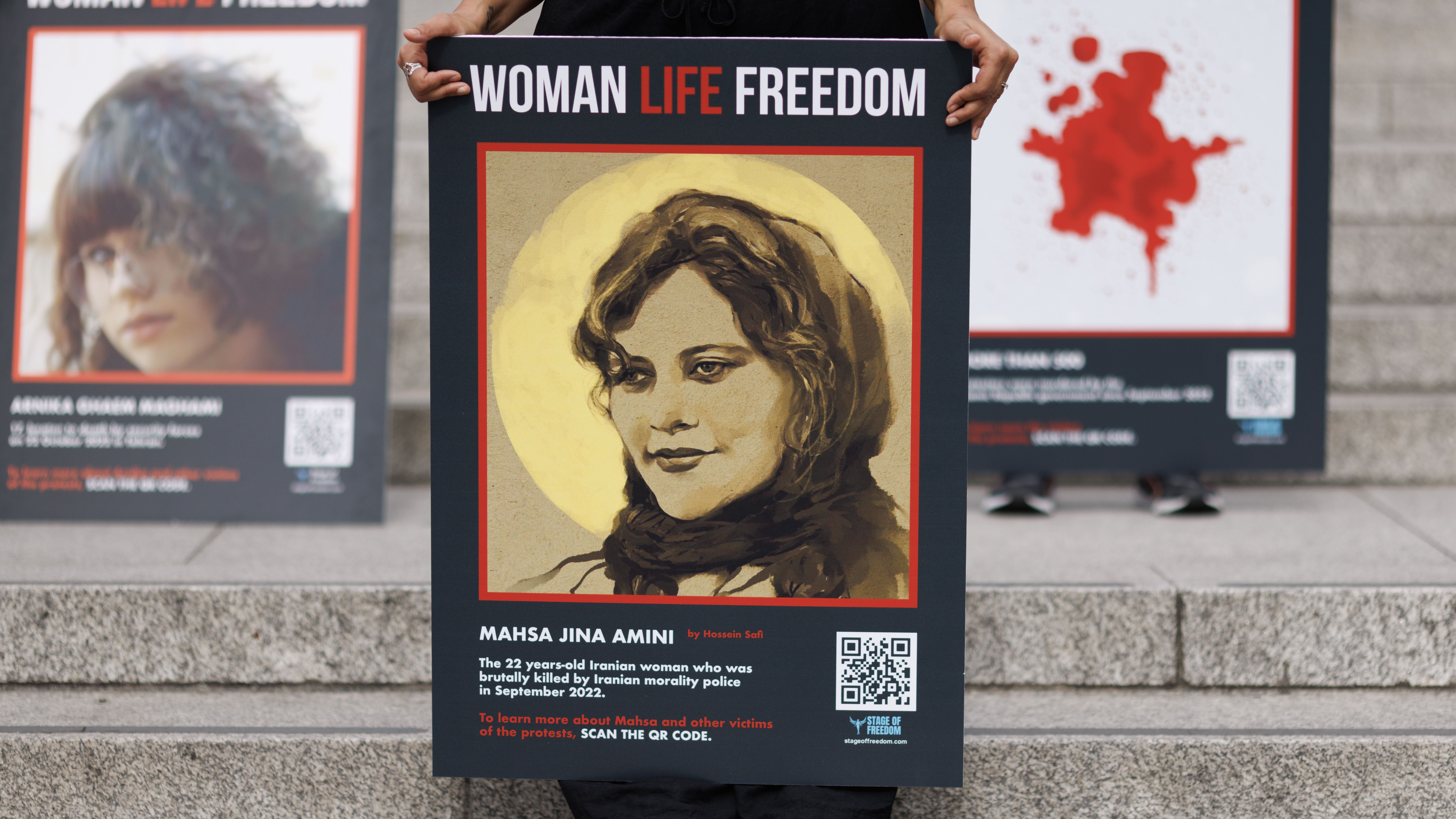Protestors Carry Portraits Of Iranian Woman Mahsa Amini Through London Ahead Of Anniversary Of Her Death
