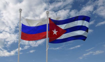 Russia and Cuba flag waving in the sky