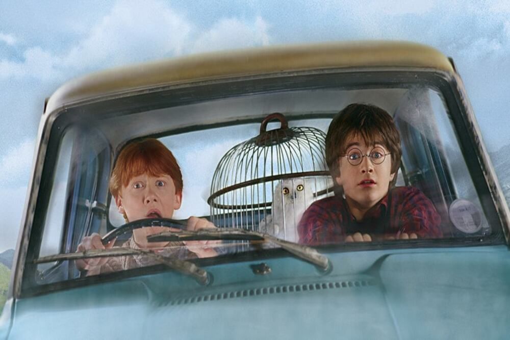 Rony e Harry com Edwiges em "A Câmara Secreta" / Unsplash/Aditya Vyas