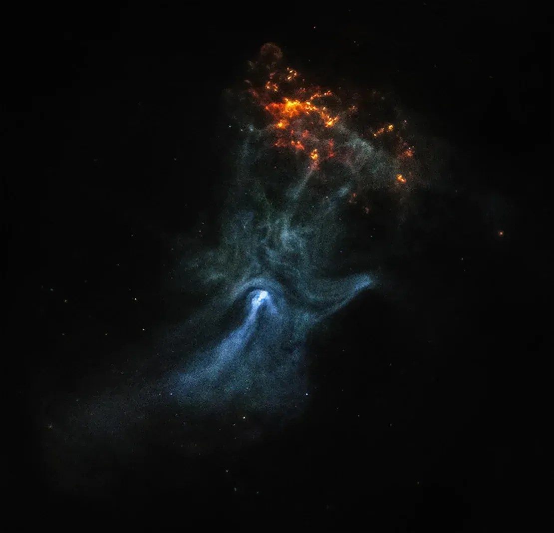 A imagem original da nebulosa feita pelo Chandra capturou o pulsar, a mancha branca brilhante dentro da “palma” desta mão fantasmagórica. / NASA/MSFC