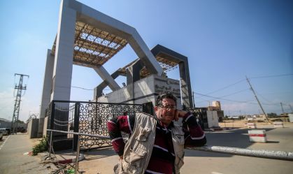 Palestinians waiting to cross the Rafah Border Gate
