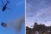 Bilionário faz 'chover dinheiro' ao jogar 1 milhão de dólares de helicóptero