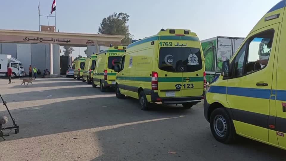 Egyptian ambulances, aid trucks cross into Gaza